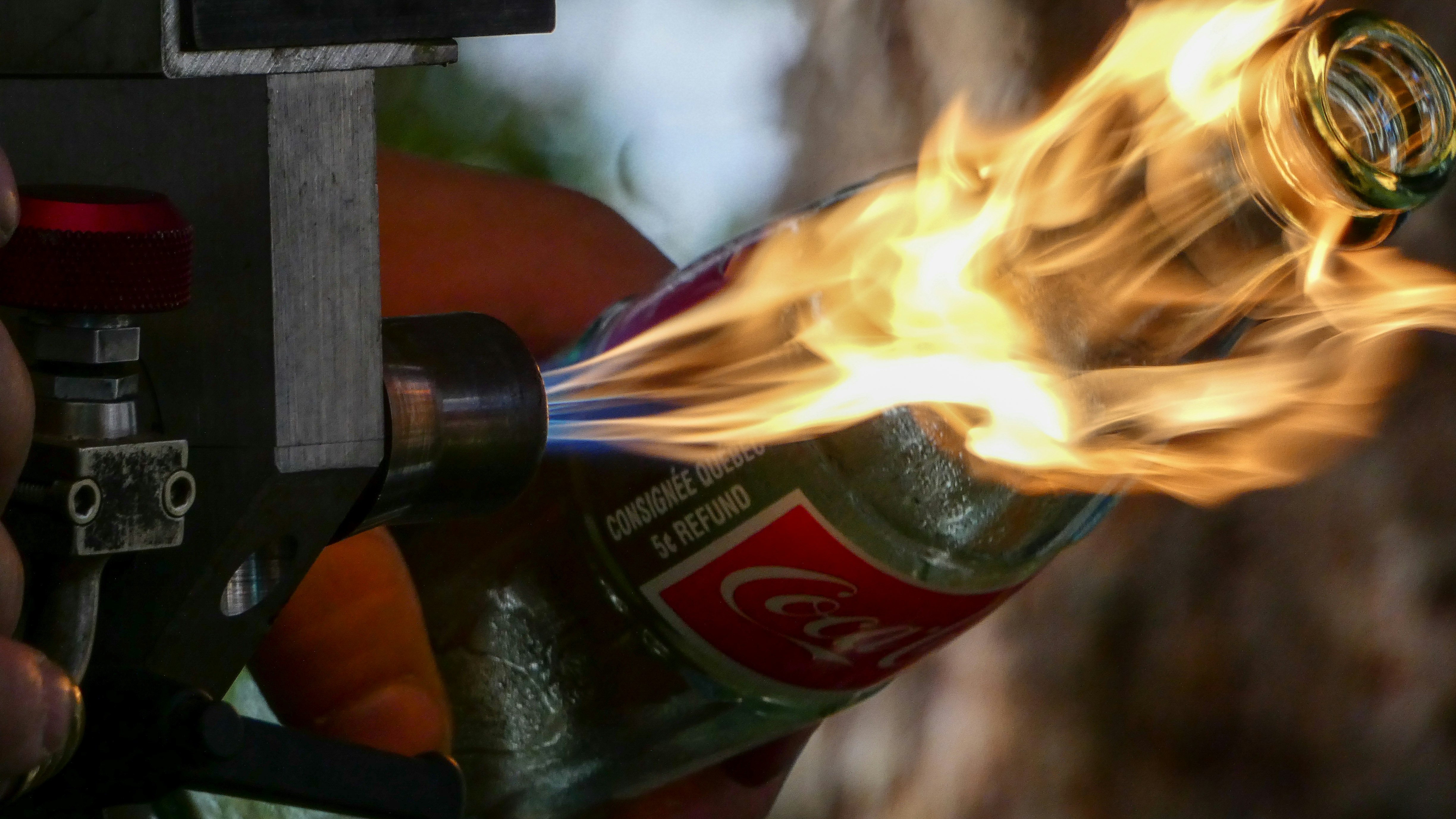 shallow focus photo of burning glass bottle